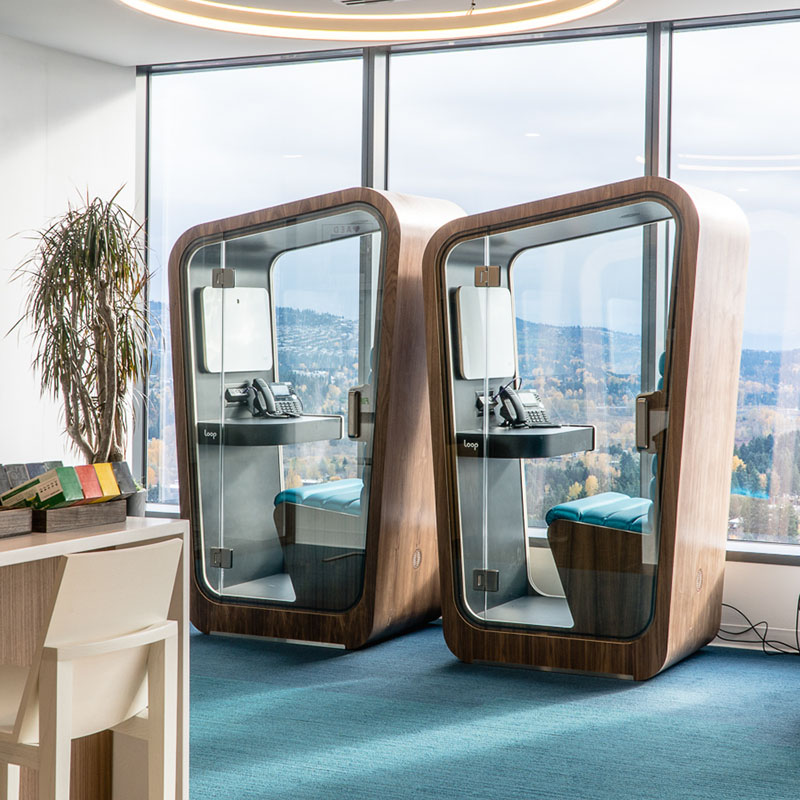 Two loop solo custom phone booths inside an office