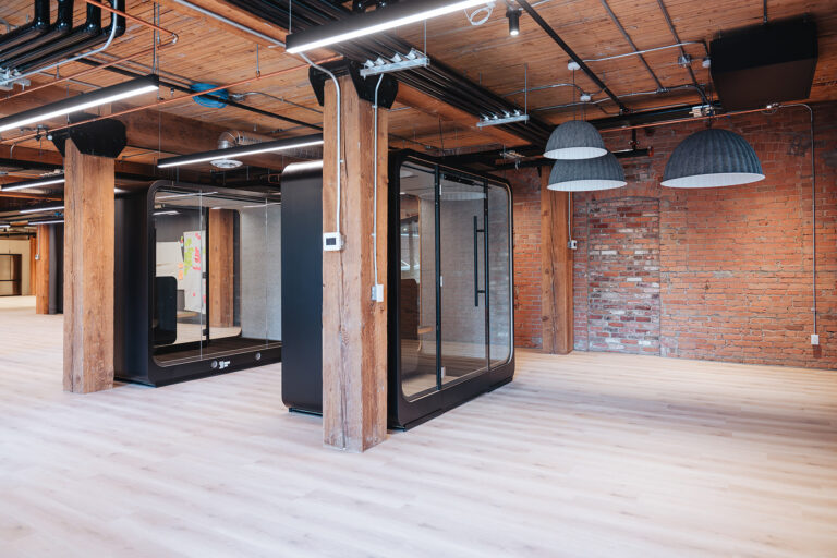 Loop Access meeting pod in exposed brick office space